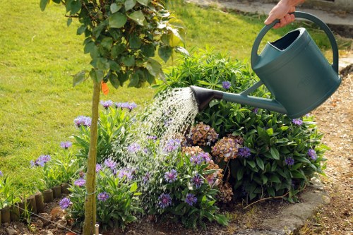 Landscaping team preparing a safe garden project in Fulham