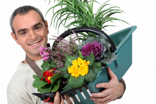 Low-carbon landscaping van collecting sorted site waste in Fulham